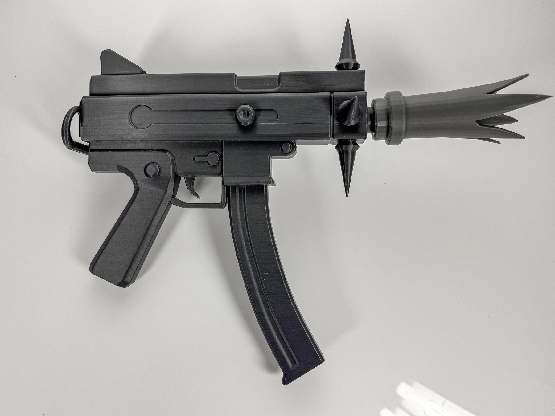 Opposite top-down view of the complete gray 3D-printed cosplay prop.
