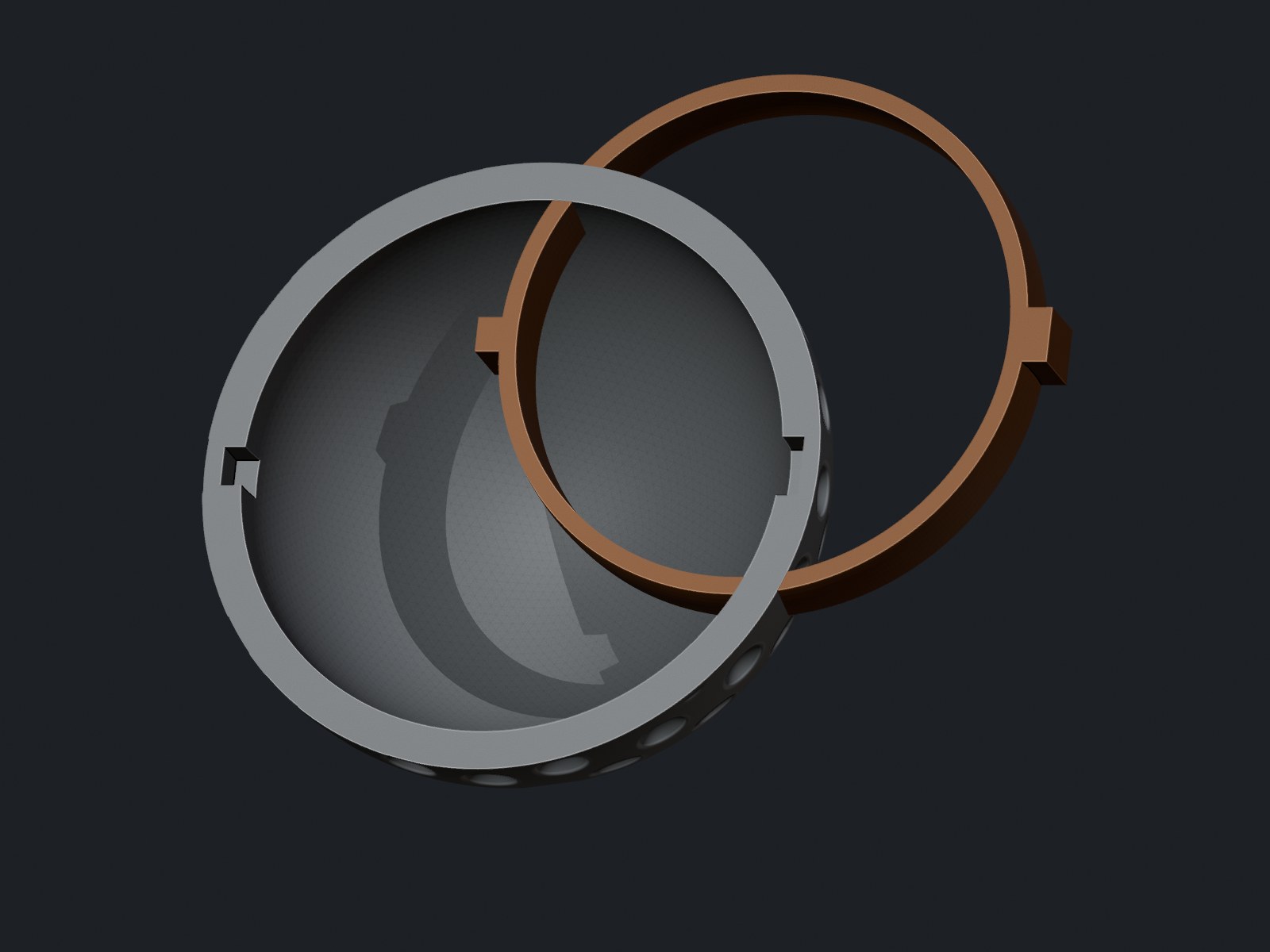 The asymmetric dual-key ring that sets field-hockey shell orientation.