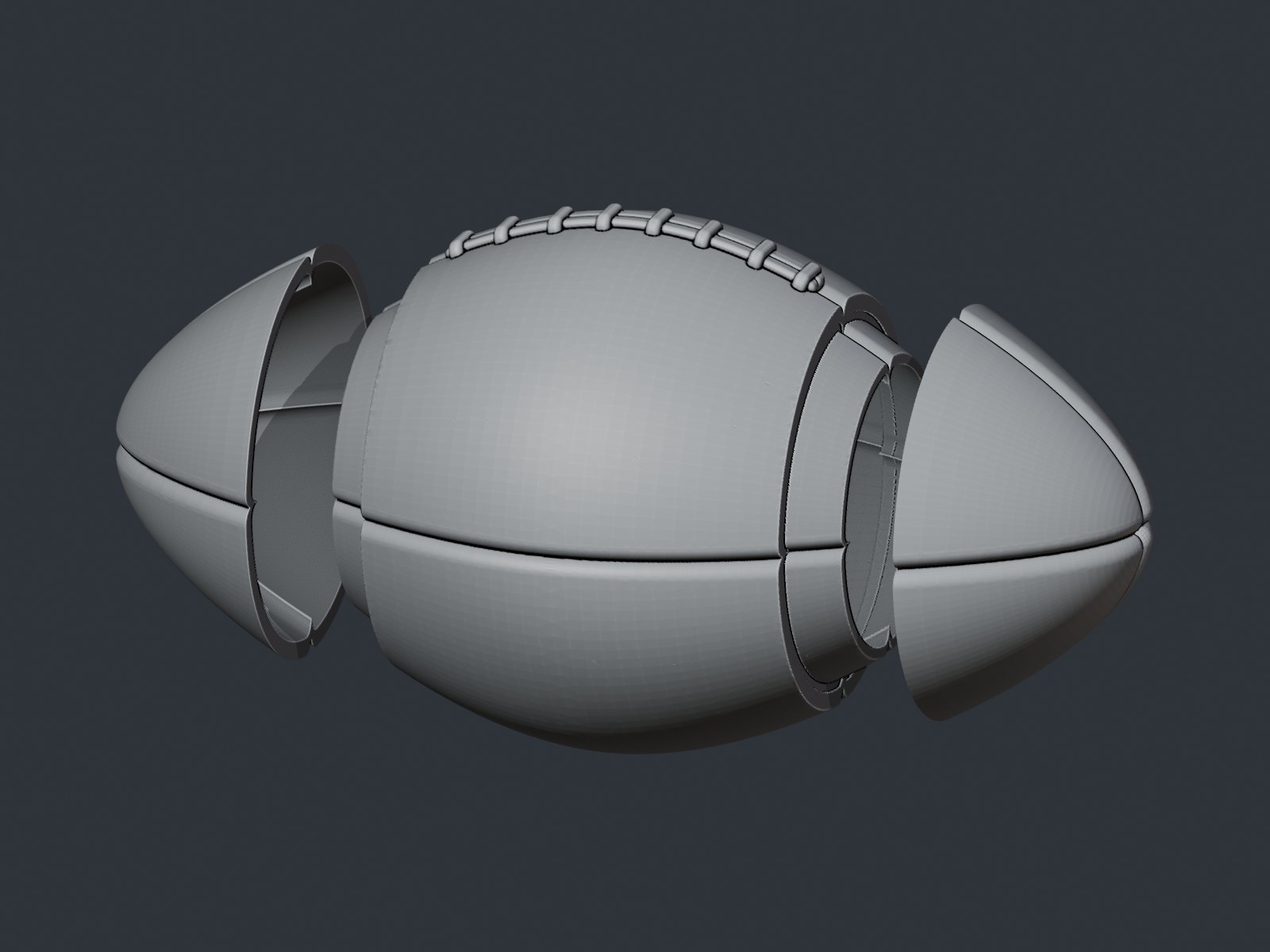 Football segmented into a center section and two end shells.