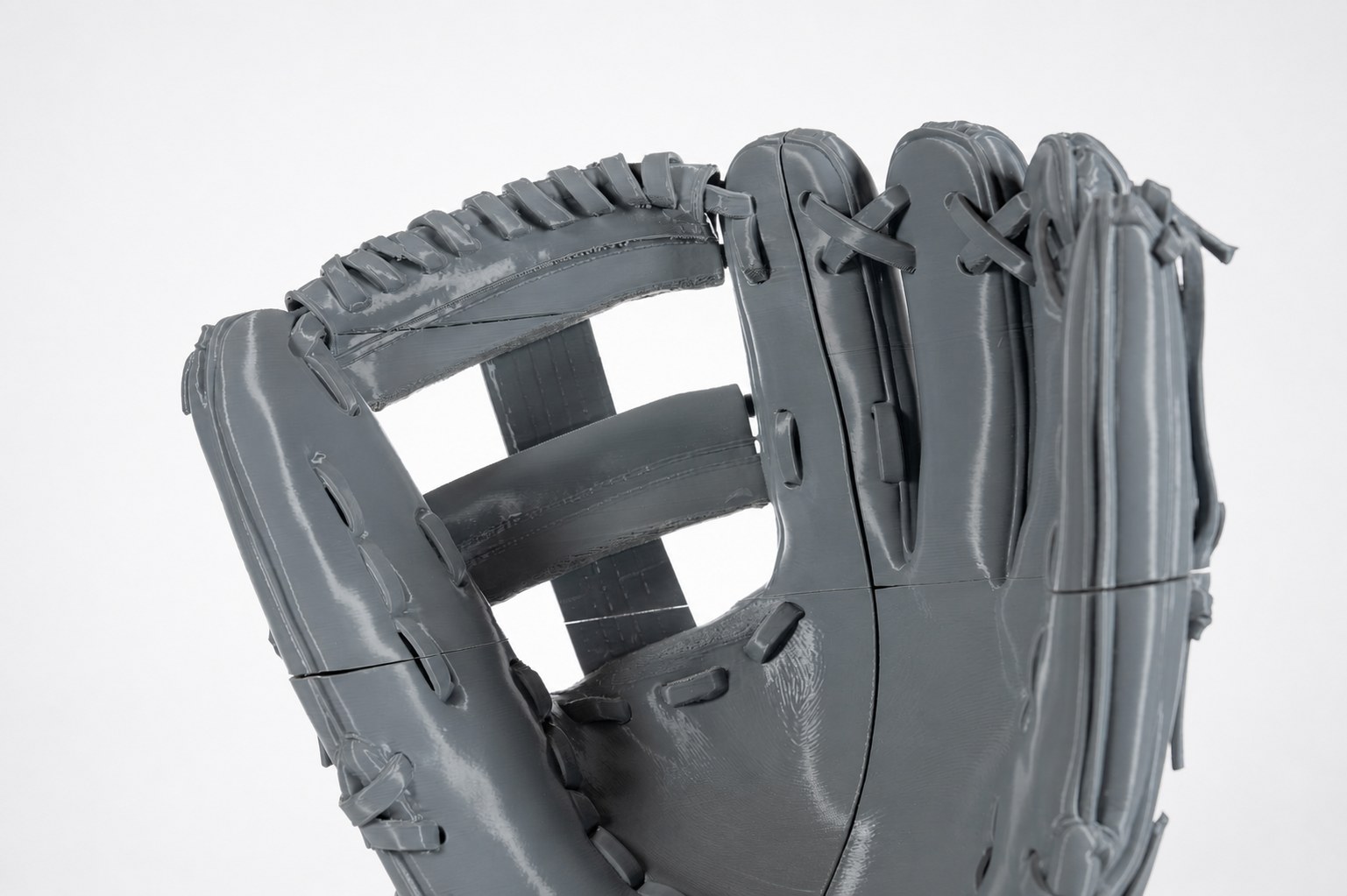 Detail of the printed glove webbing and lacing.