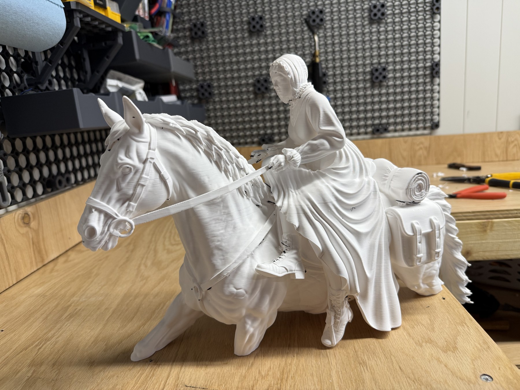 Side view of the printed horse and sidesaddle rider after support removal.